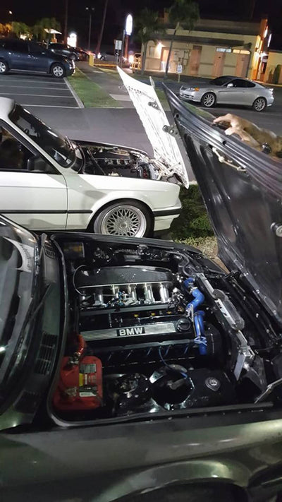 A couple of E30s with the correct Intake
